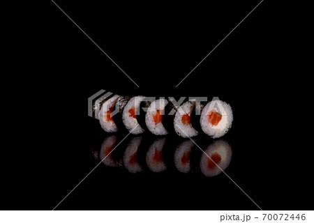 Fresh delicious beautiful sushi rolls on a dark background 70072446
