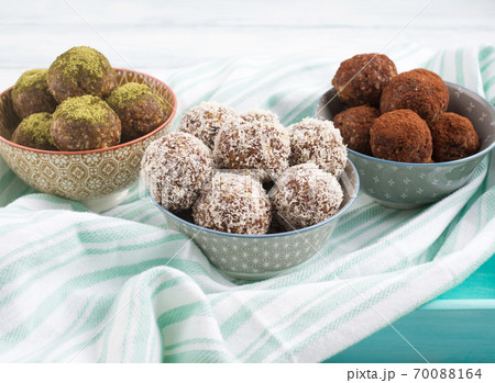 Three different taste energy balls in bowls Three different taste energy balls in bowls 70088164