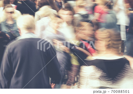 Blurred busy city traffic from people in summer Blurred busy city traffic from people in summer 70088501