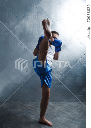 Sportsman muay thai man boxer stance posing Sportsman muay thai man boxer stance posing 70088829