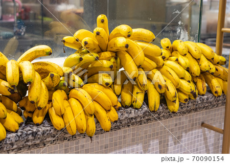 Sweet ripe bananas for sale at Asian dessert restaurant Sweet ripe bananas for sale at Asian dessert restaurant 70090154