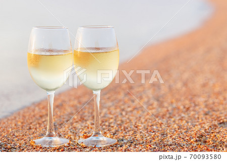two glasses of wine 70093580