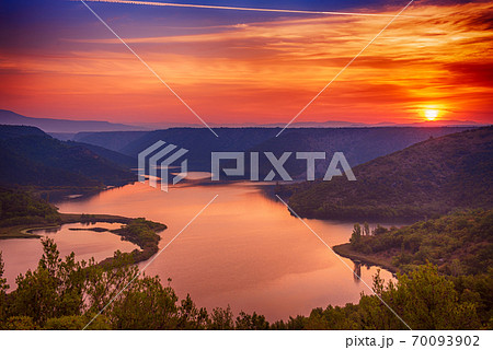 Sunrise at Krka river 70093902