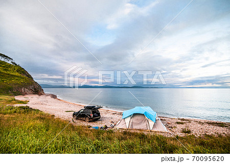 Tent camping at the sea coast 70095620