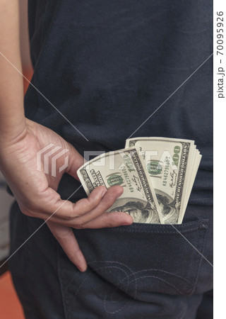 Hand holding loan money dollar bank note give financial payment. Man hands showing spread 100  70095926