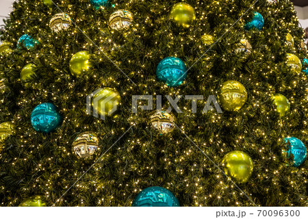 beautiful green Christmas tree colorful Hanging decoration balls closeup 70096300