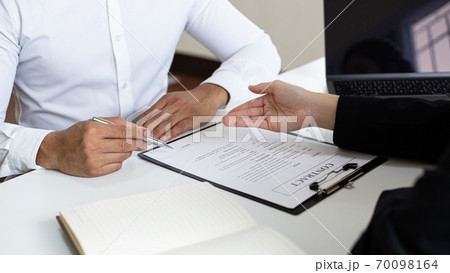 Managers or HR departments read resume and interview applicants for selection as a company real estate agent, Employment and selection of new staff representatives concept. Managers or HR departments read resume and interview applicants for selection as a company real estate agent, Employment and selection of new staff representatives concept. 70098164