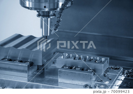 The  CNC  milling machine cutting  the mold parts. 70099423