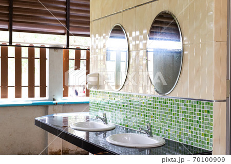 Public sinks, Handwashers for people using public toilets, Public toilets and hygiene concept. 70100909