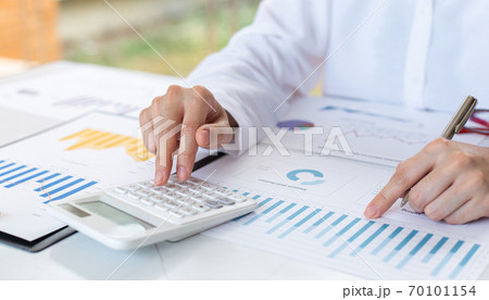 Accounting businessmen are calculating income-expenditure and analyzing real estate investment data, Financial and tax systems concept. 70101154