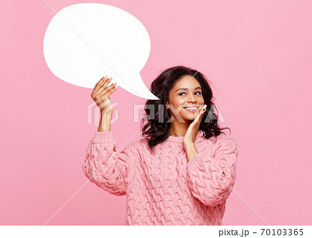 Delighted ethnic woman with speech bubble. 70103365