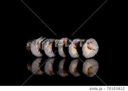Fresh delicious beautiful sushi rolls on a dark background 70103812