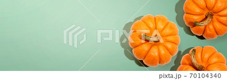 Autumn orange pumpkins overhead view Autumn orange pumpkins overhead view 70104340