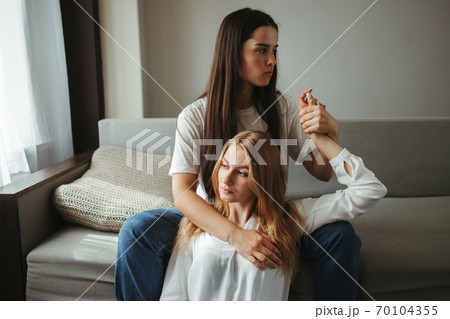 Girlfriends in love sharing time together indoors 70104355