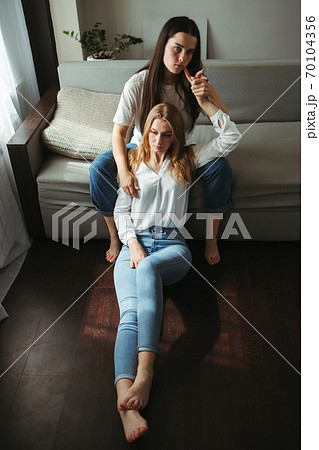 Girlfriends in love sharing time together indoors 70104356