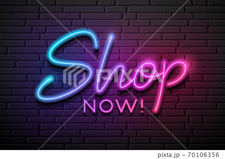 Shop now message neon light colorful design,on block wall black background 70106356