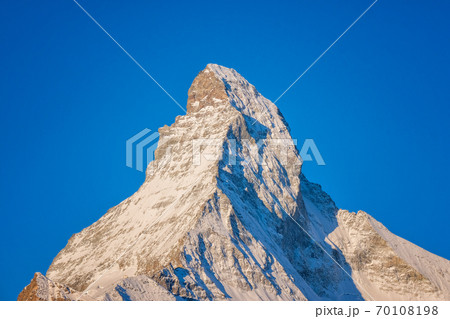 Beautiful view of village in sunrise time with Matterhorn peak background in Zermatt, Switzerland. 70108198