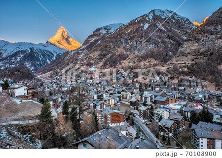 Beautiful view of village in sunrise time with Matterhorn peak background in Zermatt, Switzerland. 70108900