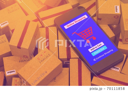 World map with mobile phone on pile of cardboard boxes. concept of International freight or shipping service for online shopping or ecommerce concept. freight forwarding business concept. 70111858