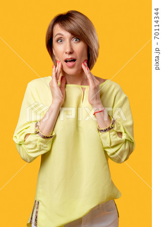 surprised woman wow unbelievable exciting news 70114344