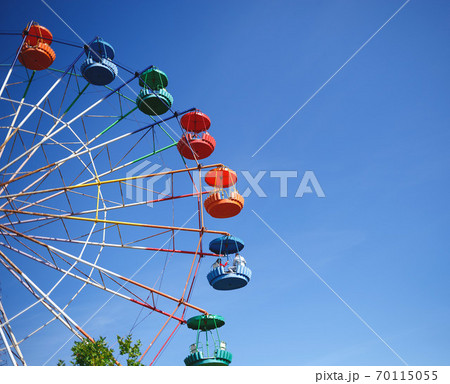 carousel ferris wheel on blue sky background carousel ferris wheel on blue sky background 70115055