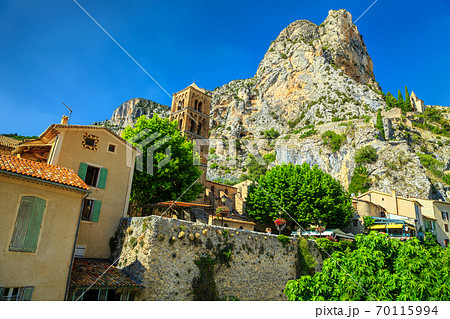 Typical medieval mediterranean facades in Moustiers-Sainte-Marie, Provence, France 70115994