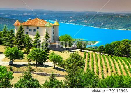 Aiguines castle with St Croix lake in background, Provence, France, Europe 70115998