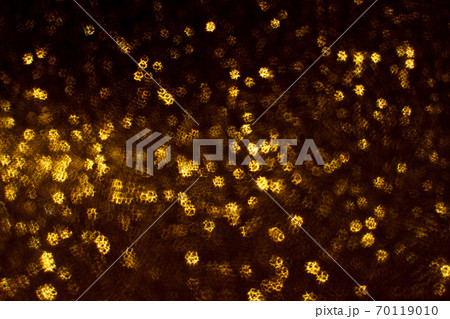 Christmas background. Festive abstract background with bokeh defocused lights and stars Christmas background. Festive abstract background with bokeh defocused lights and stars 70119010