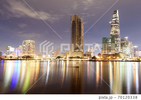 Artwork: Ho Chi Minh city skyline aerial panoramic view at night.  70120338