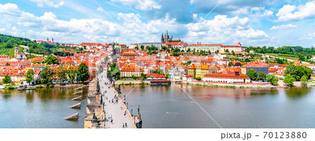 Prague panorama with Prague Castle, and Charles Bridge over Vltava River. View from Old Town Bridge Tower, Czech Republic Prague panorama with Prague Castle, and Charles Bridge over Vltava River. View from Old Town Bridge Tower, Czech Republic 70123880