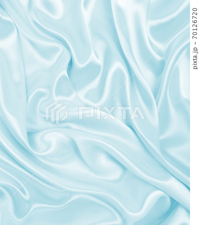 Smooth elegant blue silk or satin luxury cloth texture as abstract background. Luxurious background design 70126720
