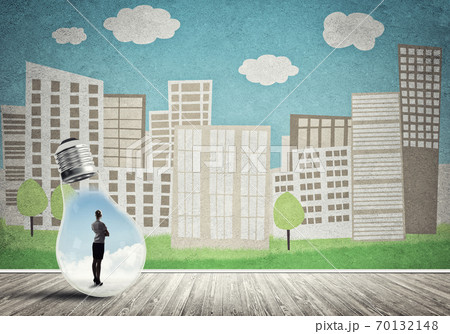 Businesswoman trapped in bulb Businesswoman trapped in bulb 70132148