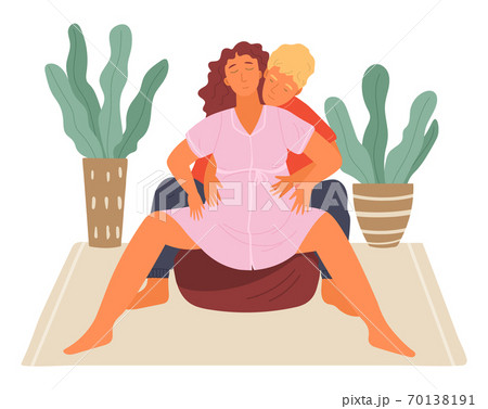 Birth position technique on fitball, man husband help pregnant woman wife during birth pains Birth position technique on fitball, man husband help pregnant woman wife during birth pains 70138191