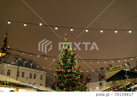 Christmas tree with decorations and lights, european Christmas market at night 70139817