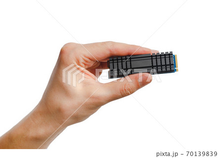 ssd nvme m2 drive in hand, isolated on white ssd nvme m2 drive in hand, isolated on white 70139839