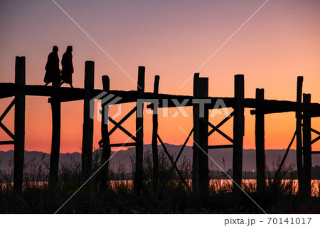 Silhouette of U Bein Bridge at sunrise near Amarapura in Myanmar former Burma 70141017