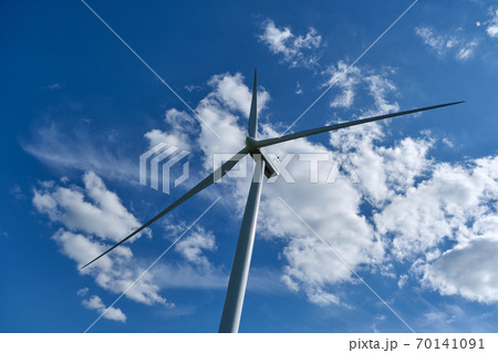 Wind turbine on blue sky background, ecological power. Alternative energy source. 70141091