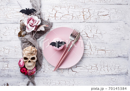 Halloween table setting in pink colors 70145384