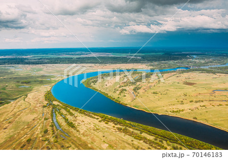 Rechytsa, Gomel Region, Belarus. Aerial View Of Dnieper River. Sky Above Green Meadow And River Landscape. Top View Of European Nature From High Attitude In Summer. Bird's Eye View 70146183
