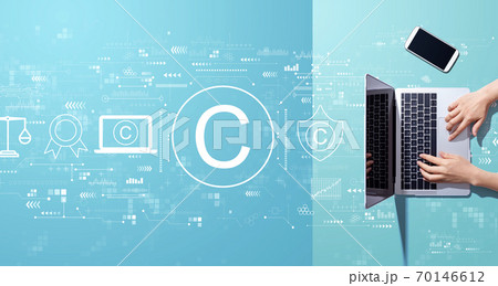 Copyright concept with person working with laptop 70146612