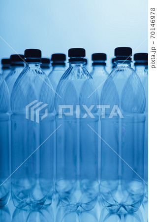 empty plastic bottle silhouettes on blue background empty plastic bottle silhouettes on blue background 70146978