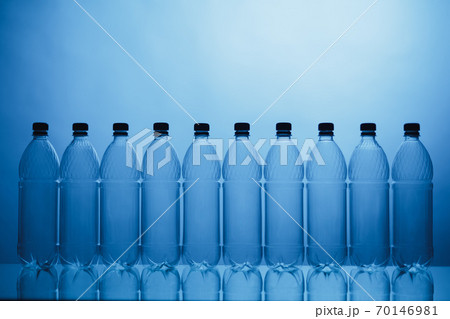 empty plastic bottle silhouettes on blue background empty plastic bottle silhouettes on blue background 70146981