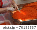 Preparing salmon caviar in the fishing processing plant 70152537