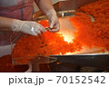 Preparing salmon caviar in the fishing processing plant 70152542