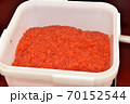 Plastic pail full of salmon caviar 70152544