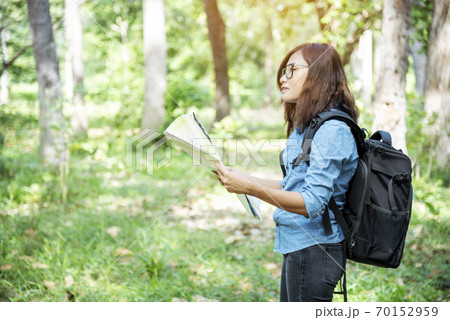 Happy hipster asian tourist travel in Asia backpack with smiling face and happiness  70152959