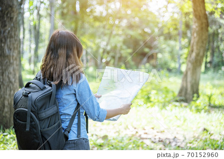 Happy hipster asian tourist travel in Asia backpack with smiling face and happiness  70152960