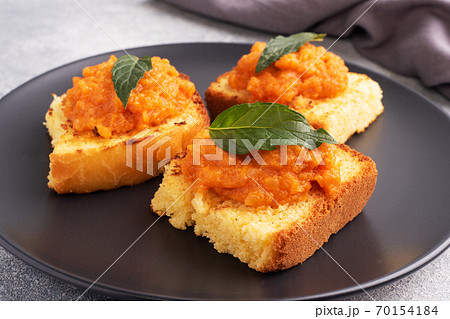 Sandwich with toast and zucchini caviar. Vegetable caviar on bread, a healthy vegetarian snack. Close up. 70154184