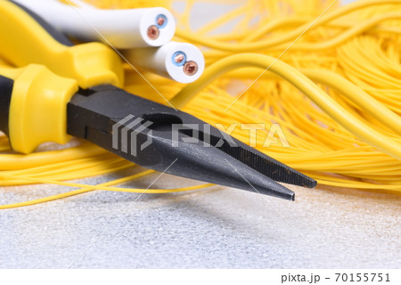 Electrical tools and cables on metal surface 70155751