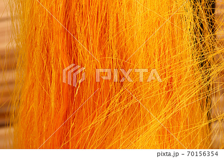 Golden yellow raw silk thread background 70156354